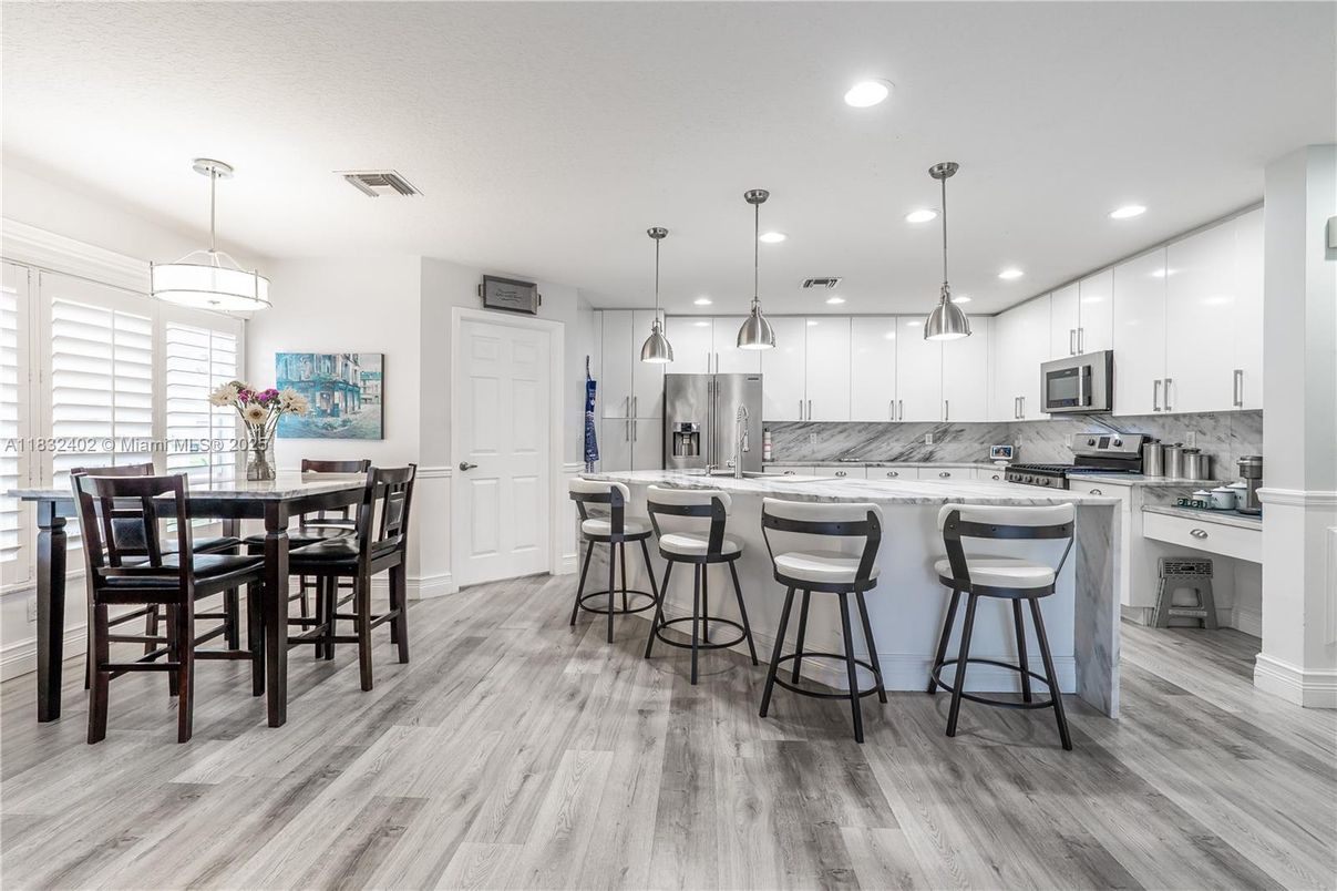 Interior, Kitchen, Pendant Lights, Recessed Lighting, Stainless Steel Appliances, Wood Texture Flooring