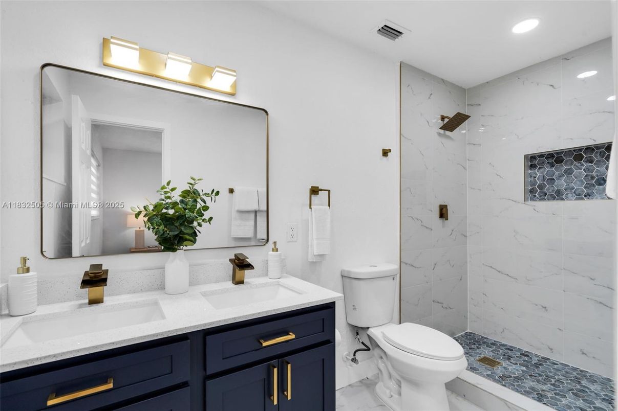 Bathroom, Dual Sink Vanities, Interior, Marble, Marble Walls, Recessed Lighting