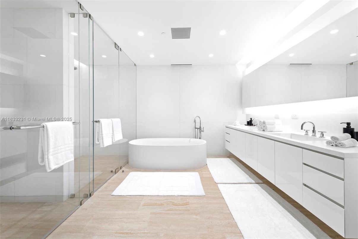 Bathroom, Dual Sink Vanities, Free Standing Baths, Glass Shower, Interior, Recessed Lighting, Wood Texture Flooring