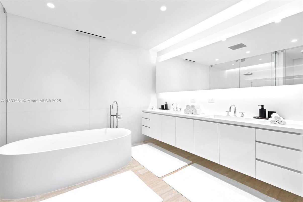 Bathroom, Dual Sink Vanities, Free Standing Baths, Glass Shower, Interior, Recessed Lighting, Wood Texture Flooring