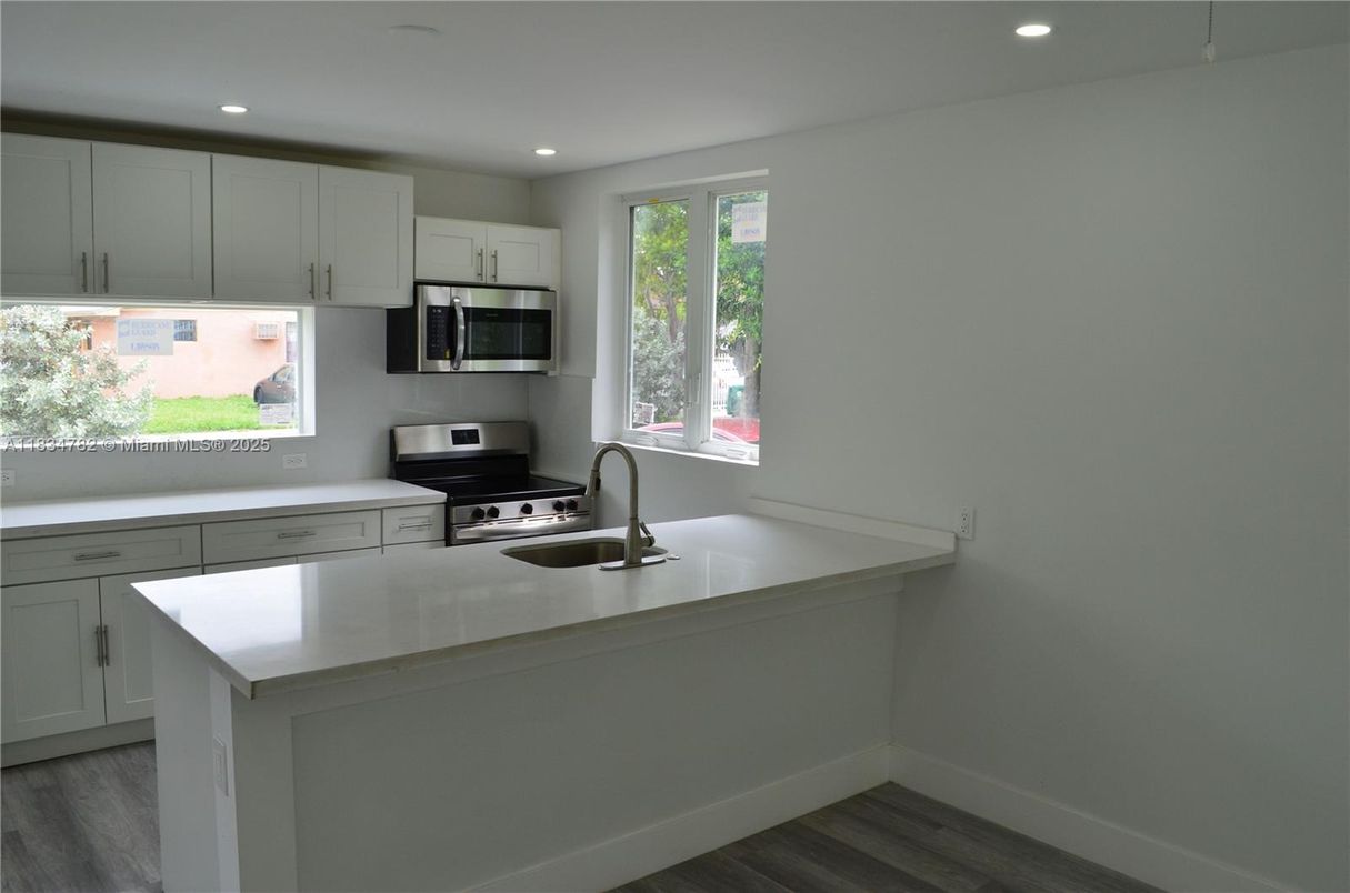 Interior, Kitchen, Recessed Lighting, Stainless Steel Appliances, Wood Texture Flooring