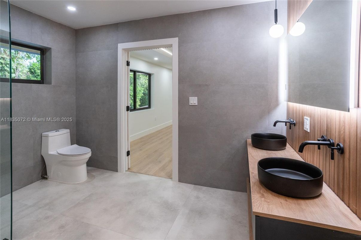 Bathroom, Dual Sink Vanities, Interior, Recessed Lighting, Wood Texture Flooring