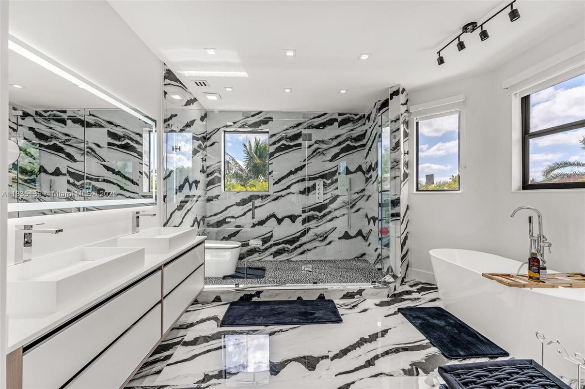 Bathroom, Dual Sink Vanities, Free Standing Baths, Glass Shower, Interior, Marble, Marble Walls, Recessed Lighting