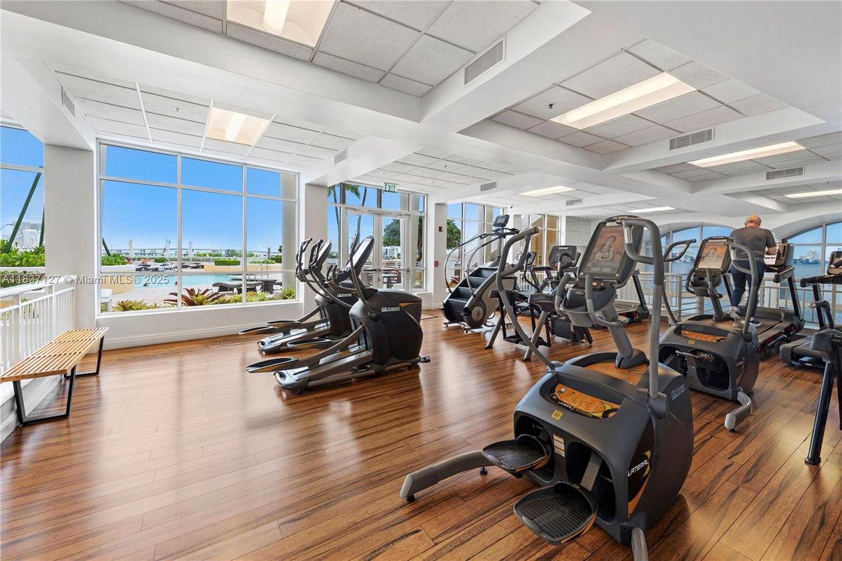 Fitness Equipment, Gym, Interior, Recessed Lighting, Water, Wood Texture Flooring