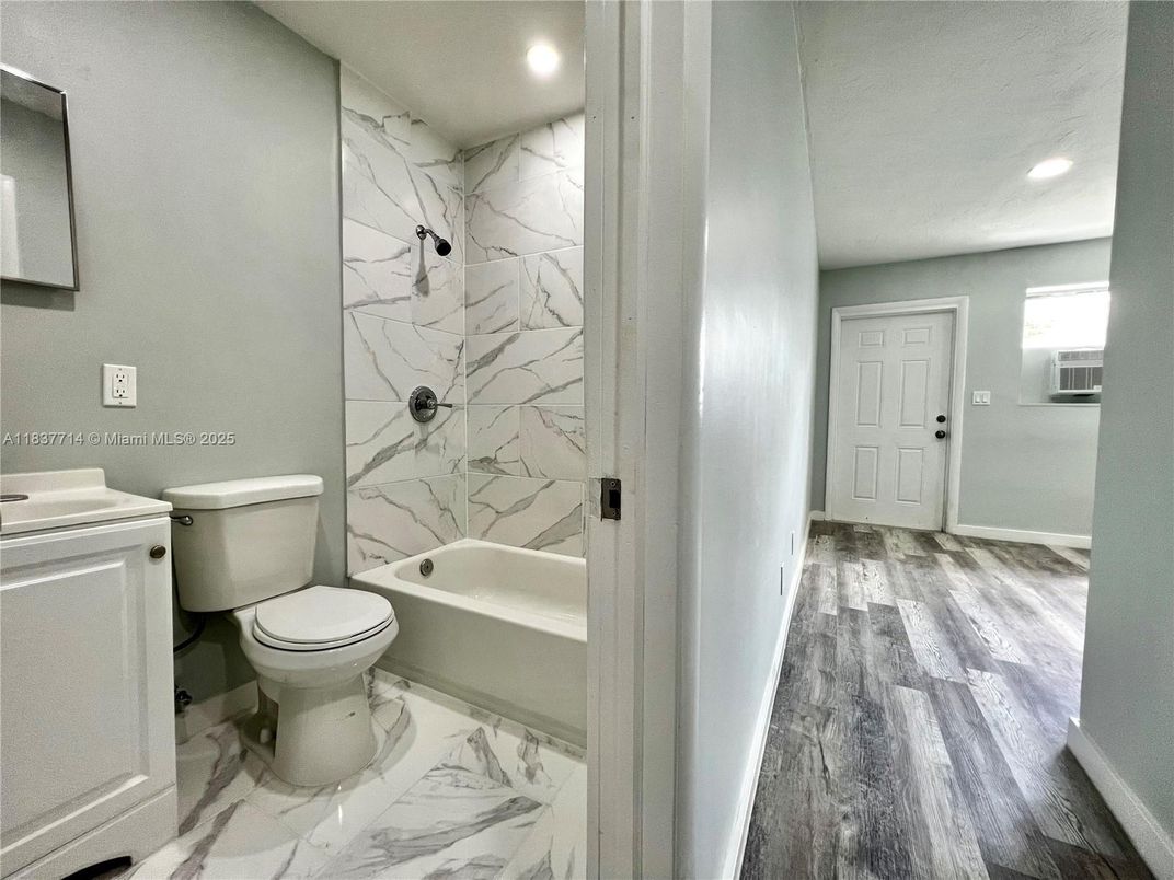 Bathroom, Interior, Marble, Marble Walls, Recessed Lighting, Wood Texture Flooring