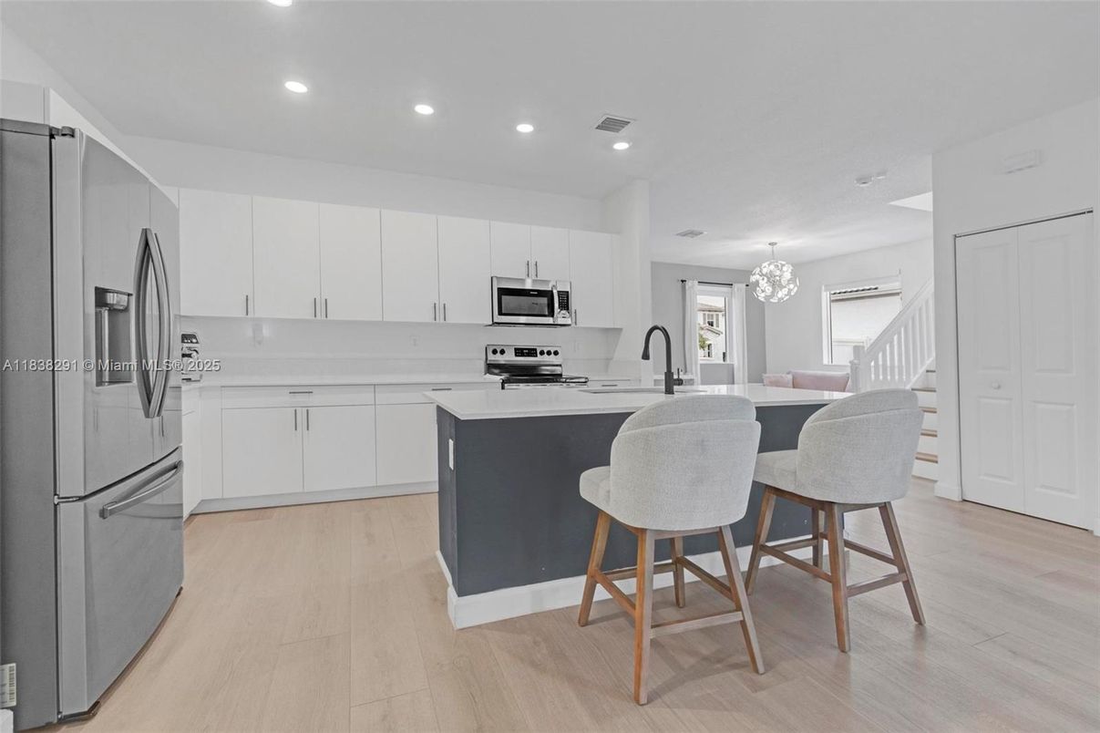 Chandelier, Interior, Kitchen, Recessed Lighting, Stainless Steel Appliances, Wood Texture Flooring