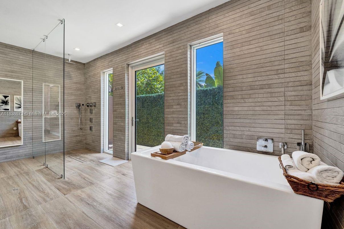 Bathroom, Free Standing Baths, Glass Shower, Interior, Recessed Lighting, Wood Texture Flooring