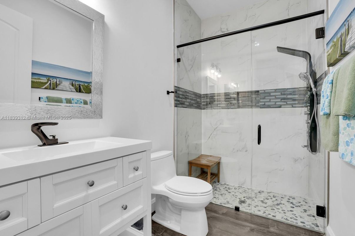 Bathroom, Glass Shower, Interior, Marble Walls, Wood Texture Flooring