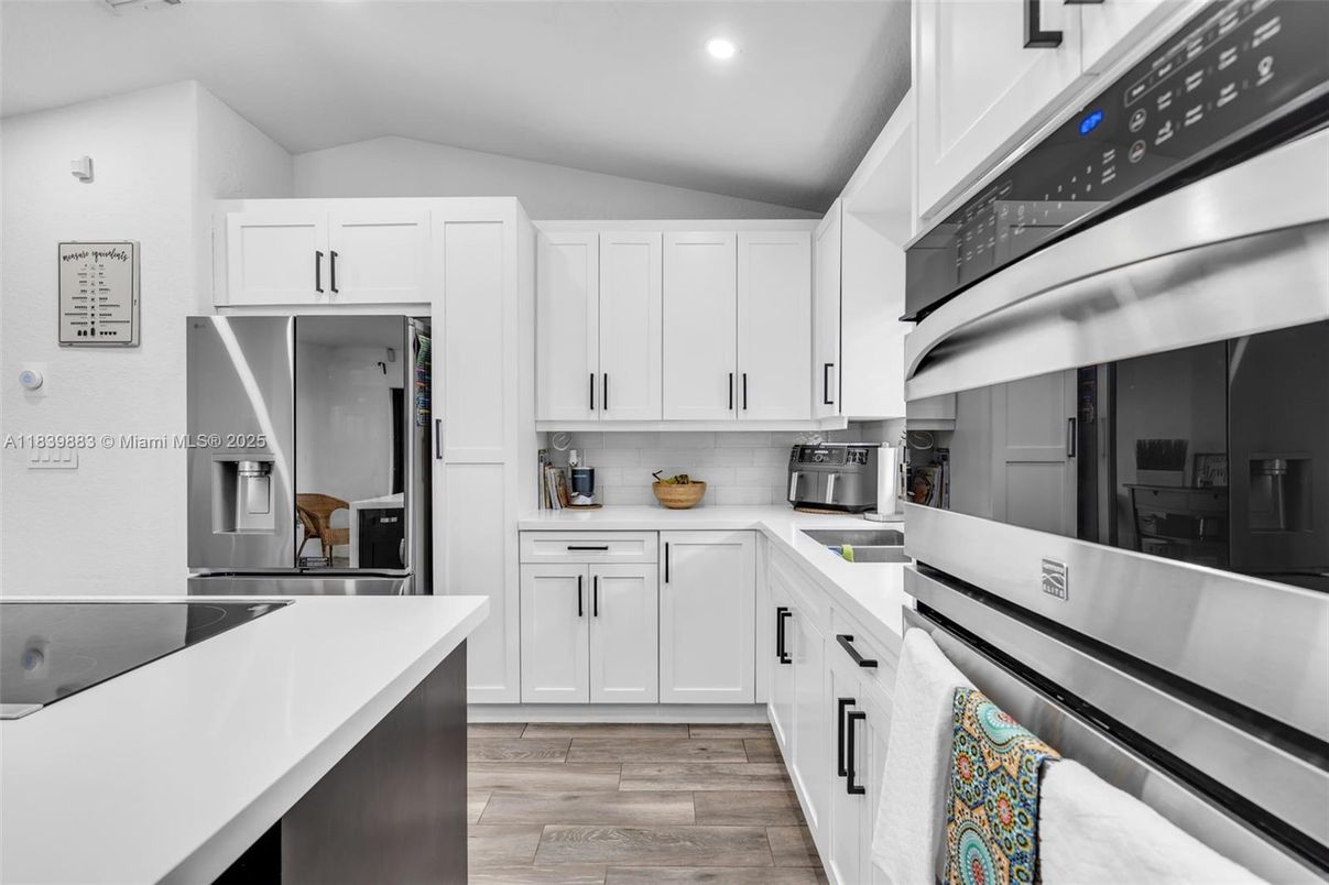 Interior, Kitchen, Recessed Lighting, Stainless Steel Appliances, Wood Texture Flooring