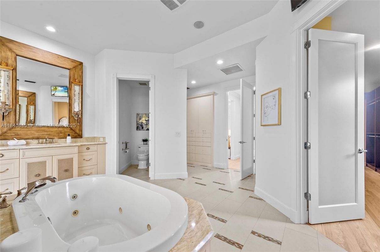 Bathroom, Dual Sink Vanities, Interior, Recessed Lighting, Wood Texture Flooring