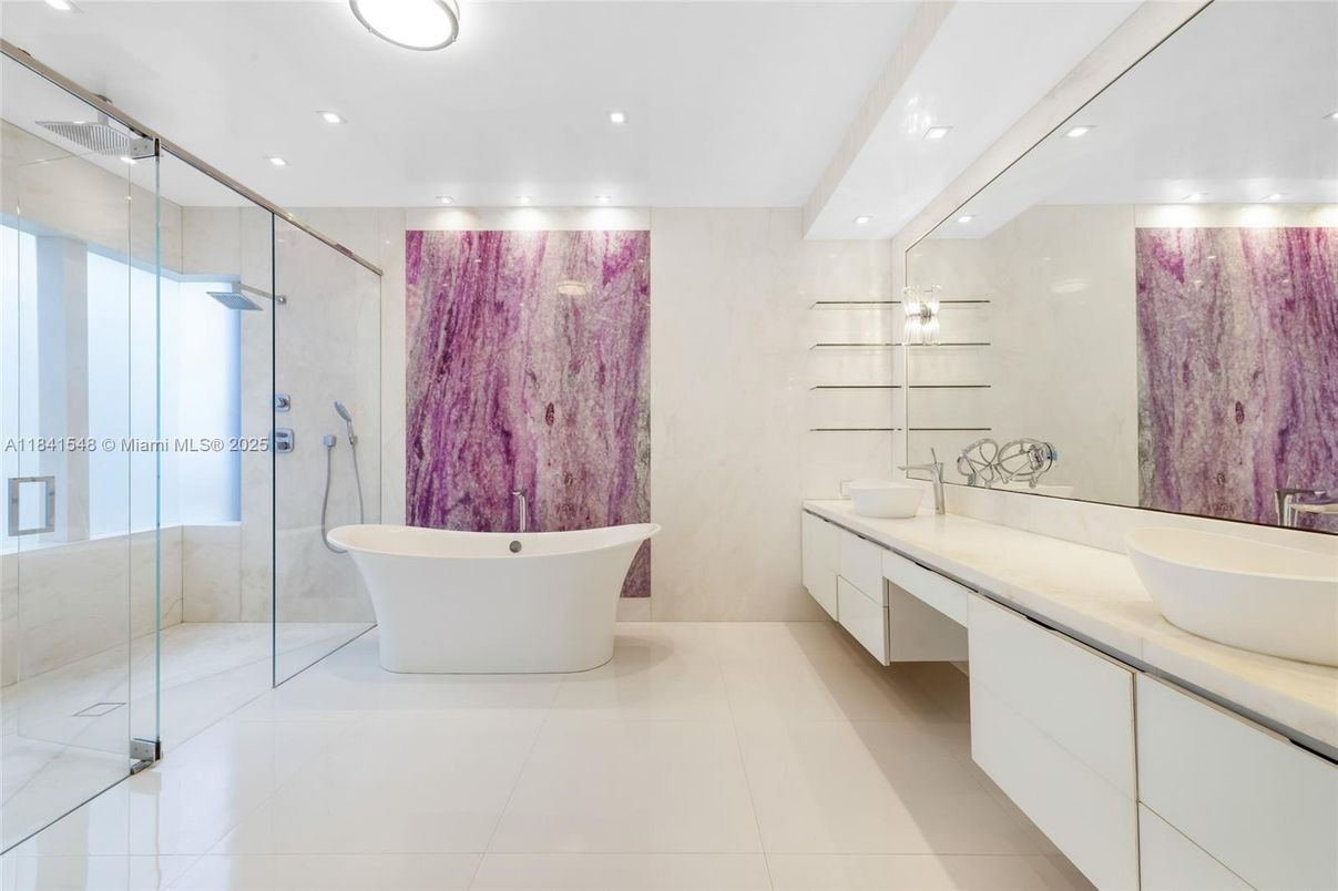 Bathroom, Dual Sink Vanities, Free Standing Baths, Glass Shower, Interior, Marble Walls, Recessed Lighting