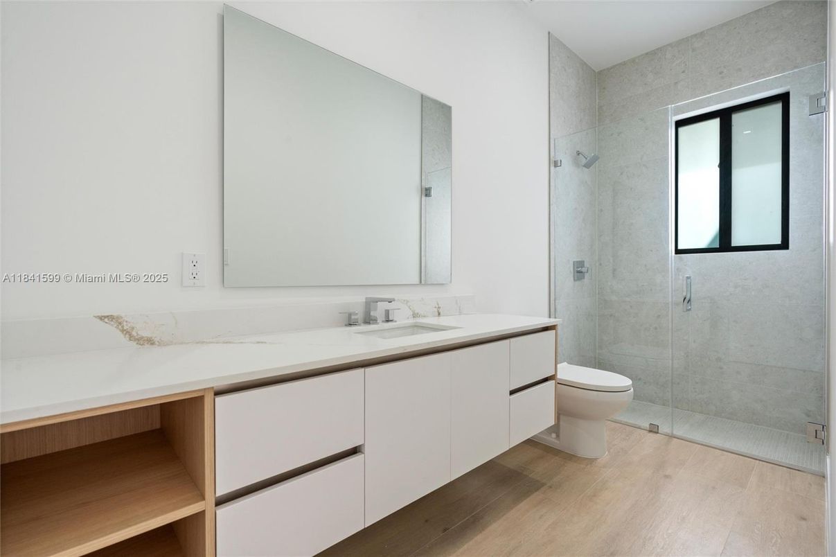 Bathroom, Dual Sink Vanities, Glass Shower, Interior, Wood Texture Flooring