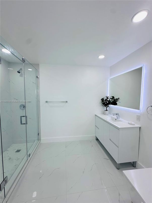 Bathroom, Dual Sink Vanities, Glass Shower, Interior, Marble, Recessed Lighting