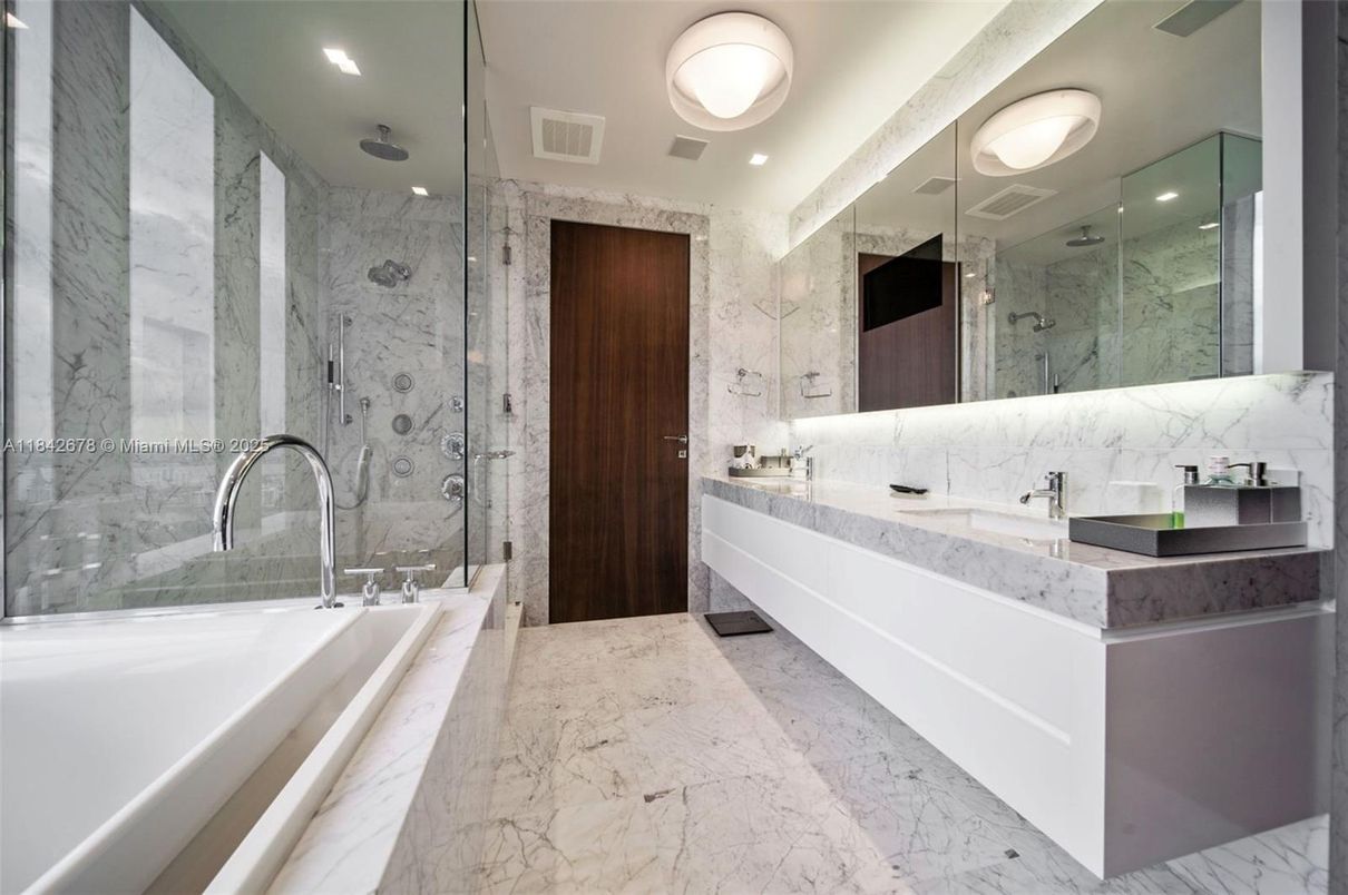 Bathroom, Dual Sink Vanities, Glass Shower, Interior, Marble, Marble Walls, Recessed Lighting