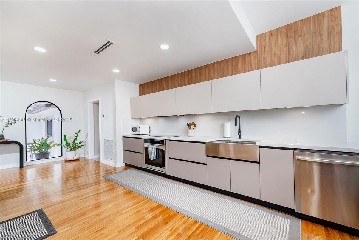 Interior, Kitchen, Recessed Lighting, Stainless Steel Appliances, Wood Texture Flooring