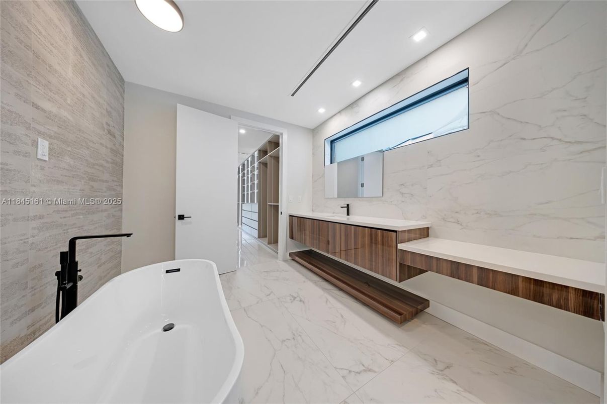 Bathroom, Dual Sink Vanities, Free Standing Baths, Interior, Marble, Marble Walls, Recessed Lighting