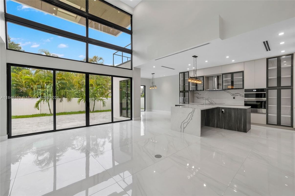 Interior, Kitchen, Marble Walls, Pendant Lights, Recessed Lighting, Stainless Steel Appliances