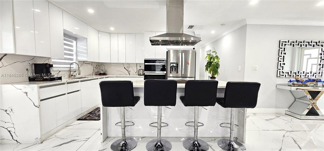 Interior, Kitchen, Marble, Marble Walls, Recessed Lighting, Stainless Steel Appliances