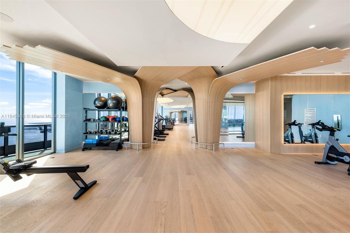 Fitness Equipment, Gym, Interior, Recessed Lighting, Water, Wood Texture Flooring