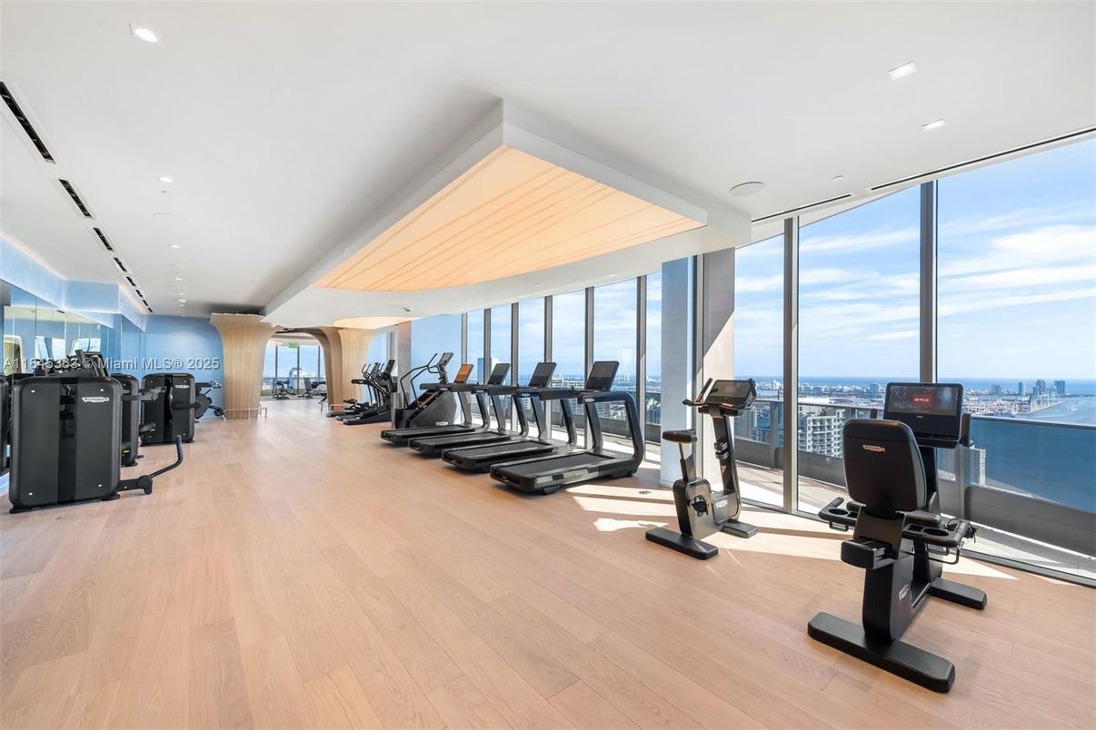 Fitness Equipment, Gym, Interior, Recessed Lighting, Water, Wood Texture Flooring