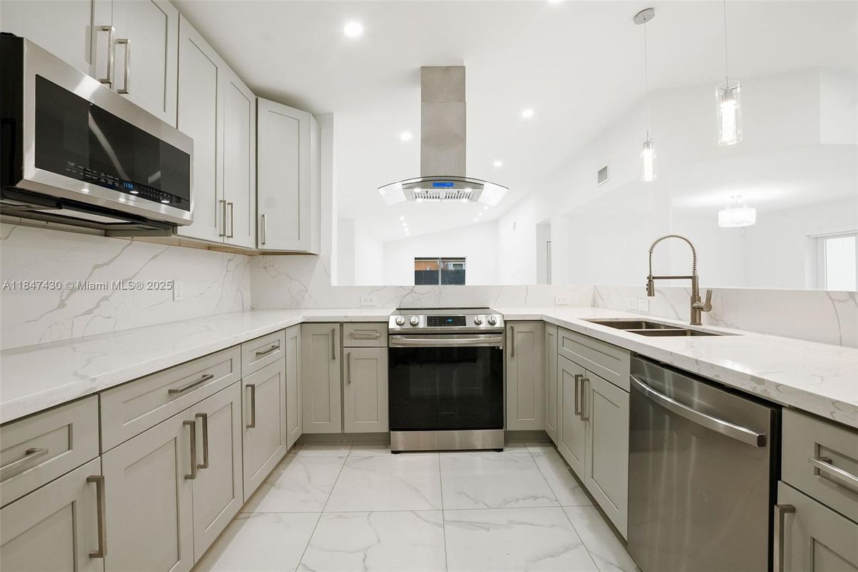 Interior, Kitchen, Marble, Marble Walls, Recessed Lighting, Stainless Steel Appliances