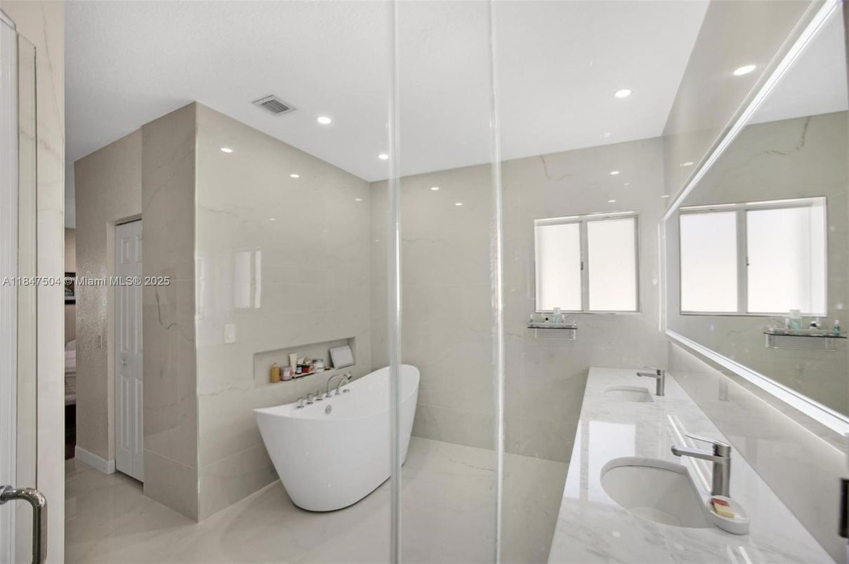 Bathroom, Dual Sink Vanities, Free Standing Baths, Glass Shower, Interior, Marble, Marble Walls, Recessed Lighting
