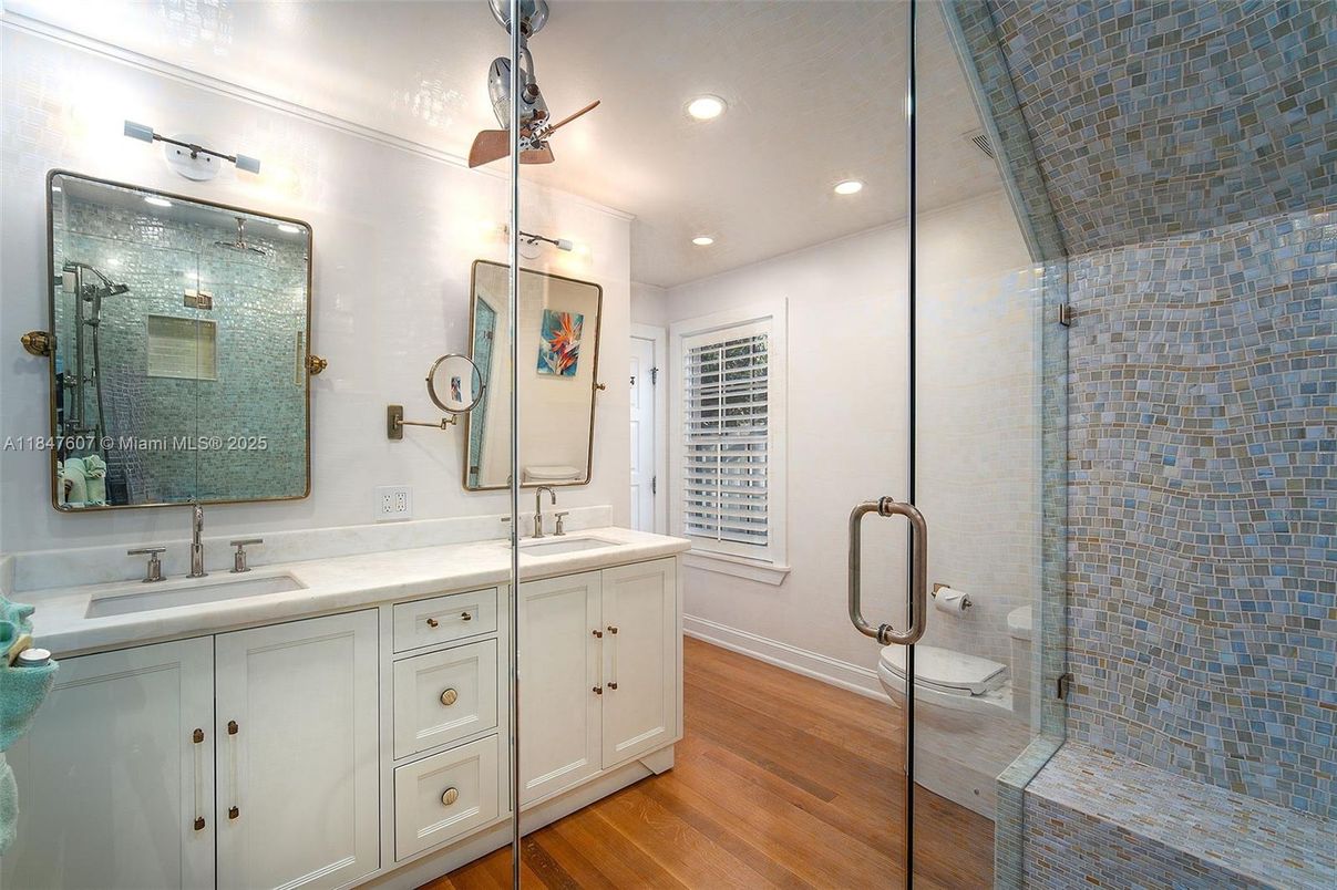 Bathroom, Dual Sink Vanities, Glass Shower, Interior, Recessed Lighting, Wood Texture Flooring