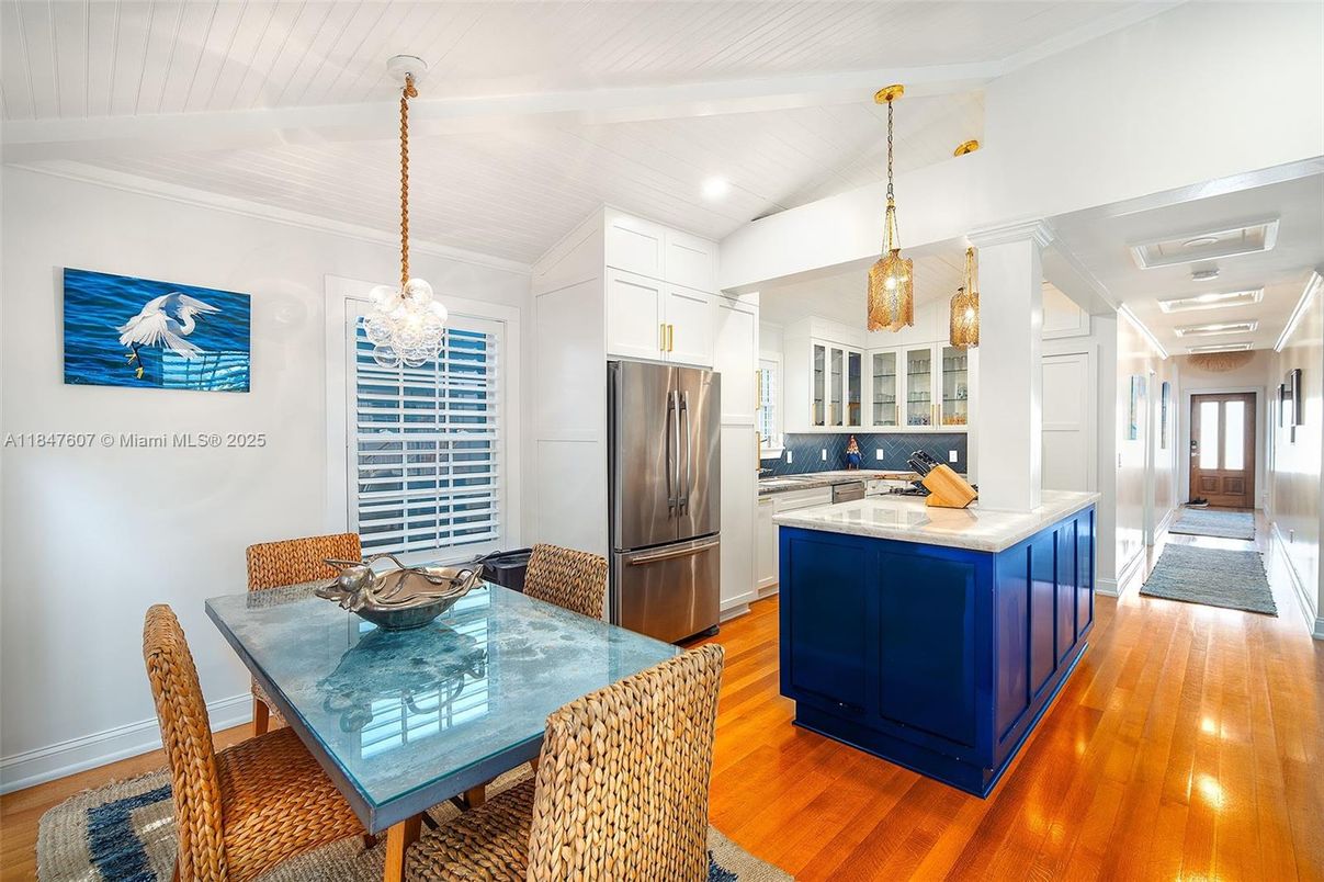 Dining room, Interior, Kitchen, Pendant Lights, Recessed Lighting, Stainless Steel Appliances, Wood Texture Flooring
