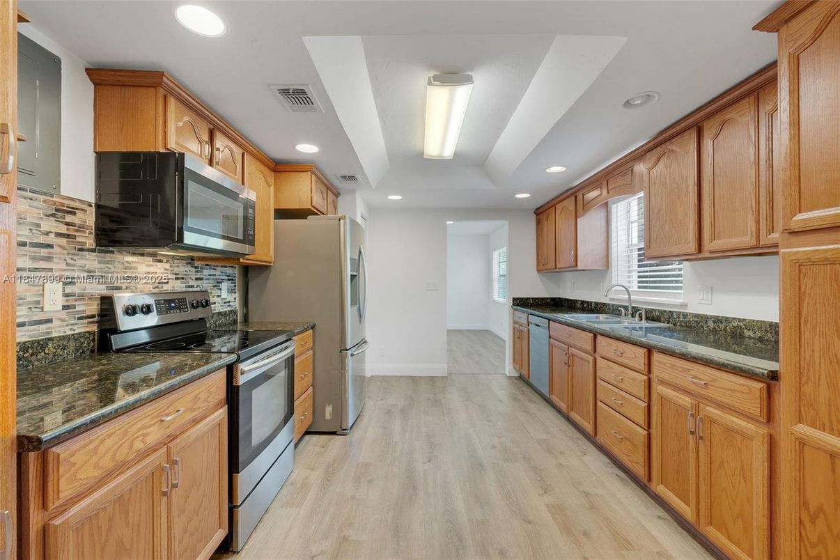 Interior, Kitchen, Recessed Lighting, Stainless Steel Appliances, Wood Texture Flooring