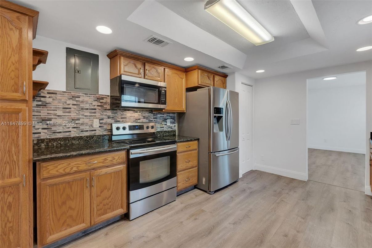 Interior, Kitchen, Recessed Lighting, Stainless Steel Appliances, Wood Texture Flooring