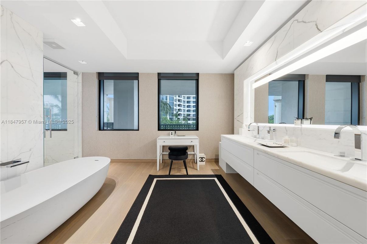 Bathroom, Dual Sink Vanities, Free Standing Baths, Interior, Marble Walls, Recessed Lighting, Wood Texture Flooring