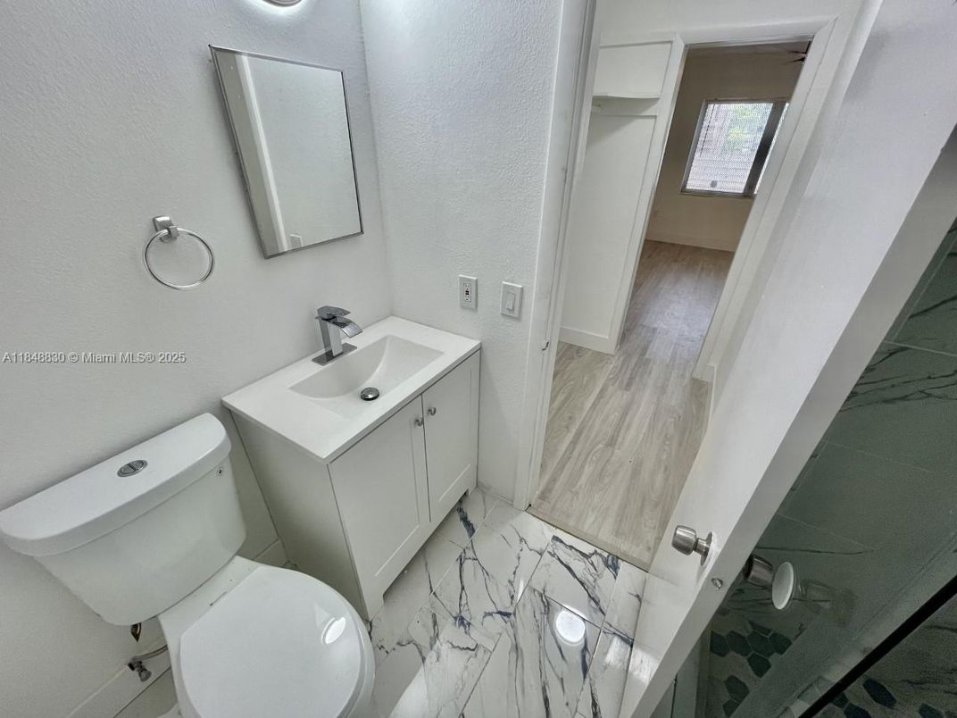 Bathroom, Dual Sink Vanities, Interior, Marble, Wood Texture Flooring