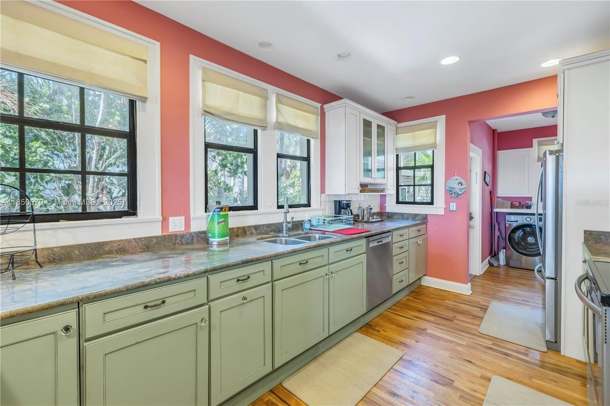 Interior, Kitchen, Recessed Lighting, Washer, Wood Texture Flooring