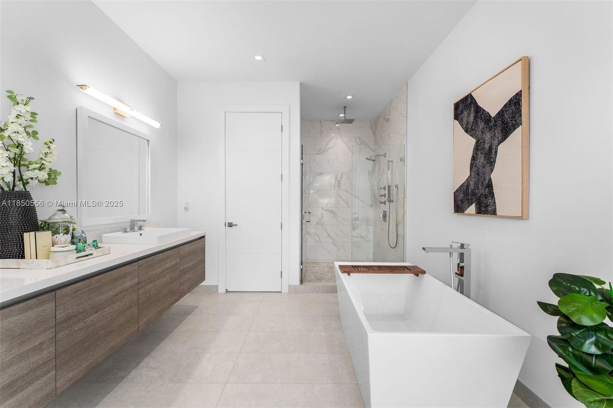 Bathroom, Dual Sink Vanities, Free Standing Baths, Glass Shower, Interior, Marble Walls, Recessed Lighting