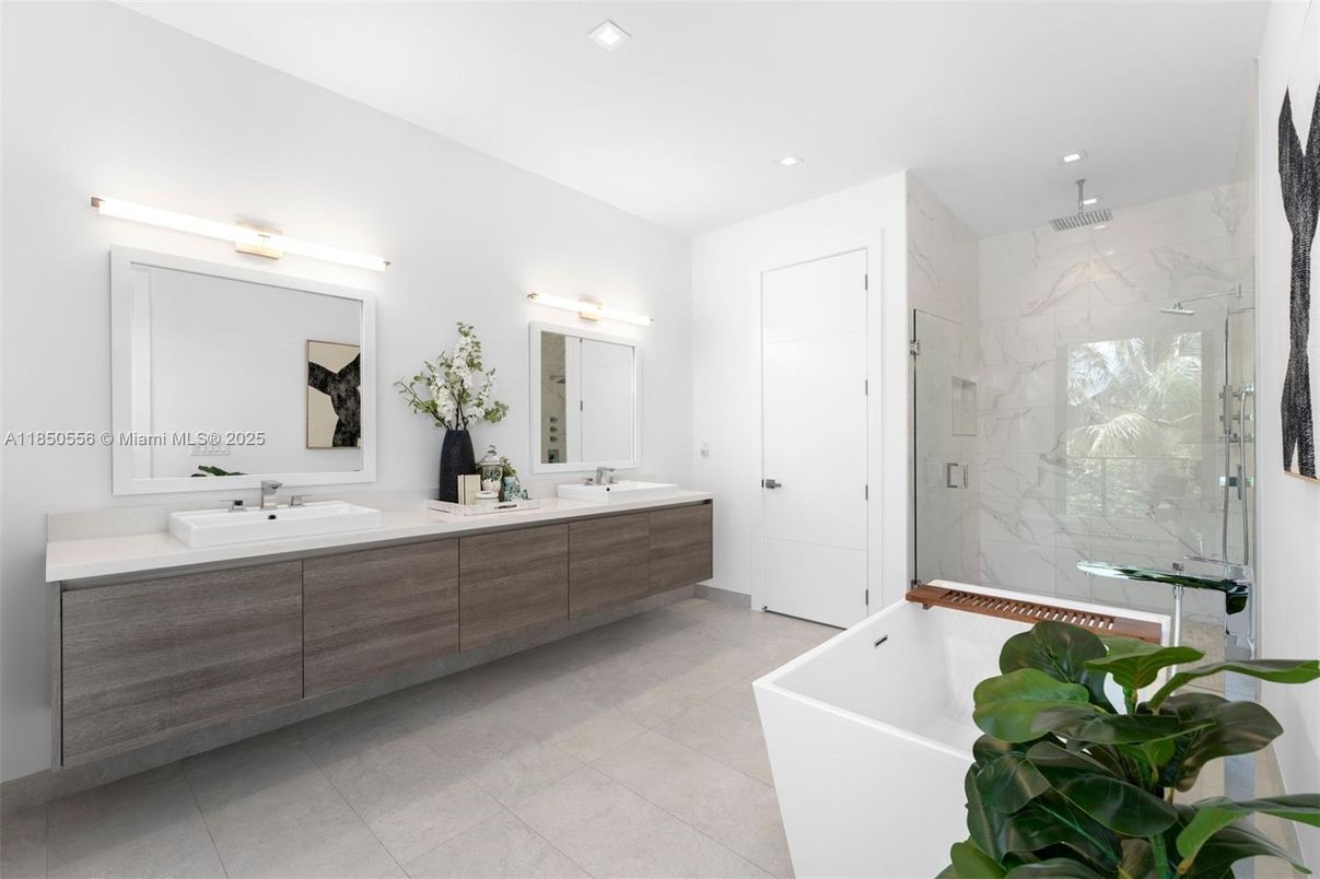 Bathroom, Dual Sink Vanities, Free Standing Baths, Glass Shower, Interior, Marble Walls, Recessed Lighting