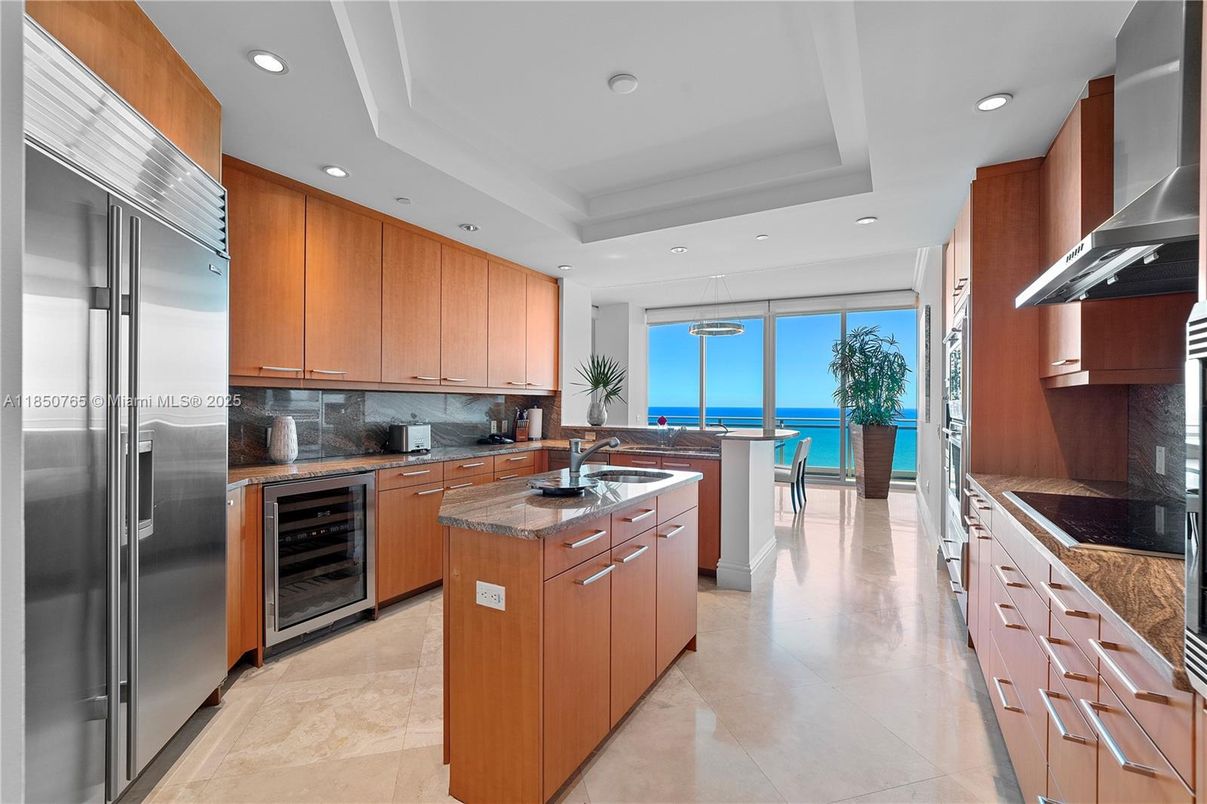 Interior, Kitchen, Recessed Lighting, Stainless Steel Appliances, Tile Countertops, Water