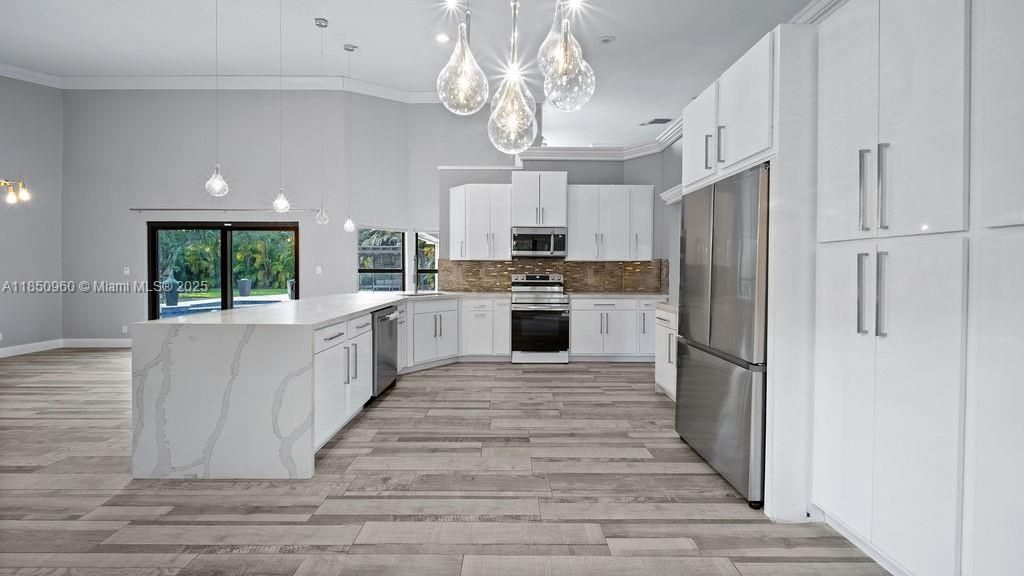 Interior, Kitchen, Pendant Lights, Recessed Lighting, Stainless Steel Appliances, Wood Texture Flooring