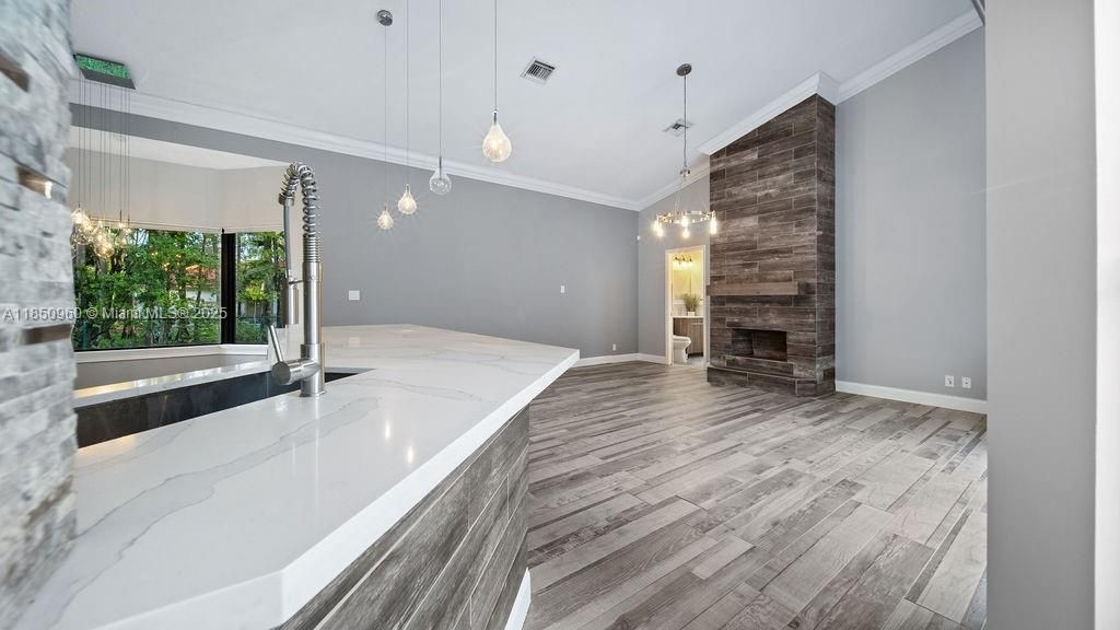 Empty room, Fireplace, Interior, Pendant Lights, Wood Texture Flooring