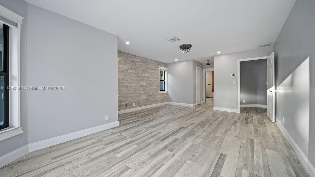 Empty room, Interior, Recessed Lighting, Stone Walls, Wood Texture Flooring