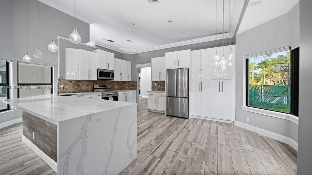 Interior, Kitchen, Pendant Lights, Recessed Lighting, Stainless Steel Appliances, Wood Texture Flooring