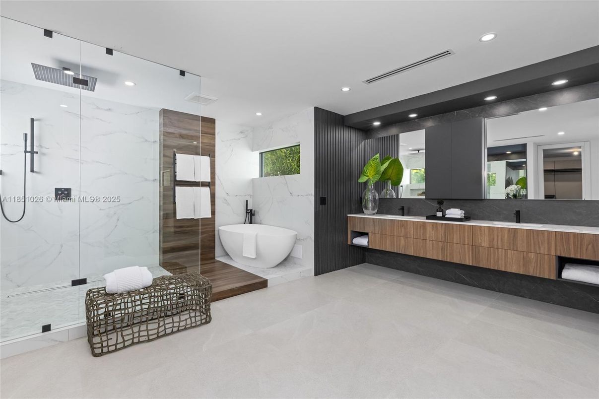 Bathroom, Dual Sink Vanities, Free Standing Baths, Glass Shower, Interior, Marble Walls, Recessed Lighting