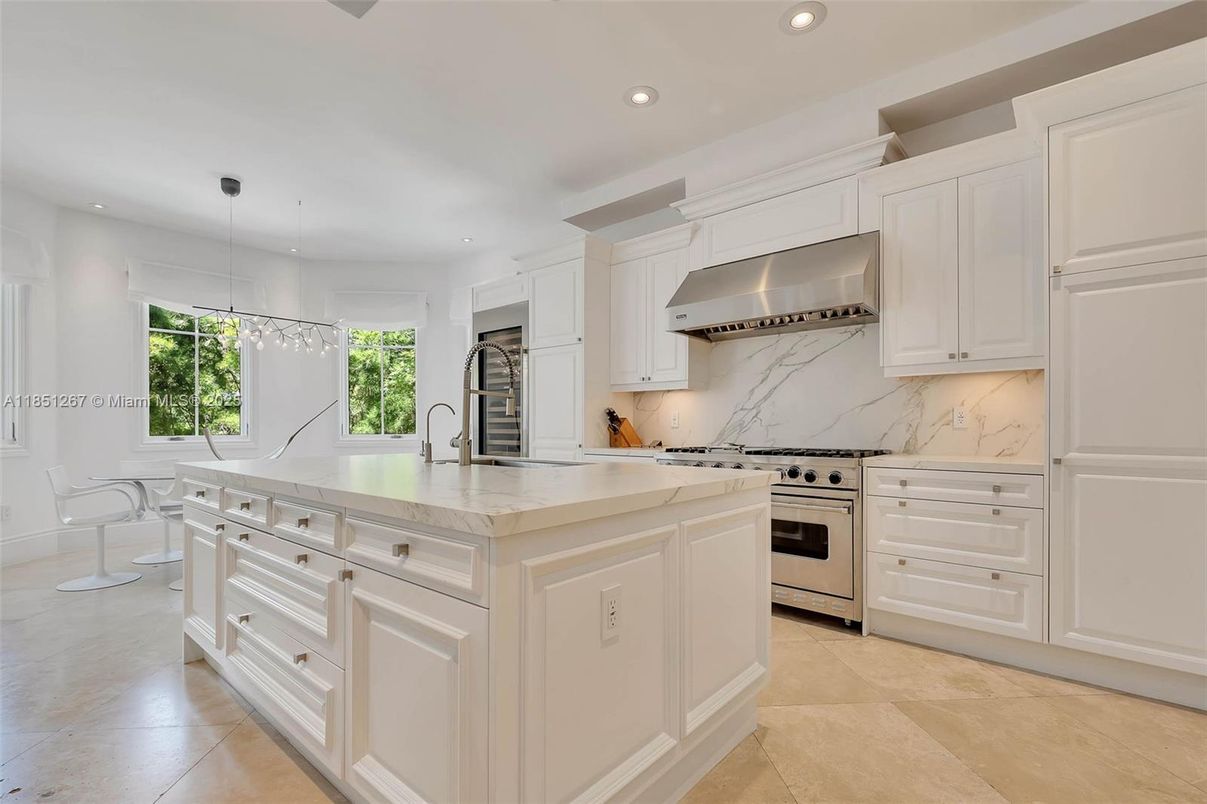Interior, Kitchen, Marble Walls, Pendant Lights, Recessed Lighting, Stainless Steel Appliances