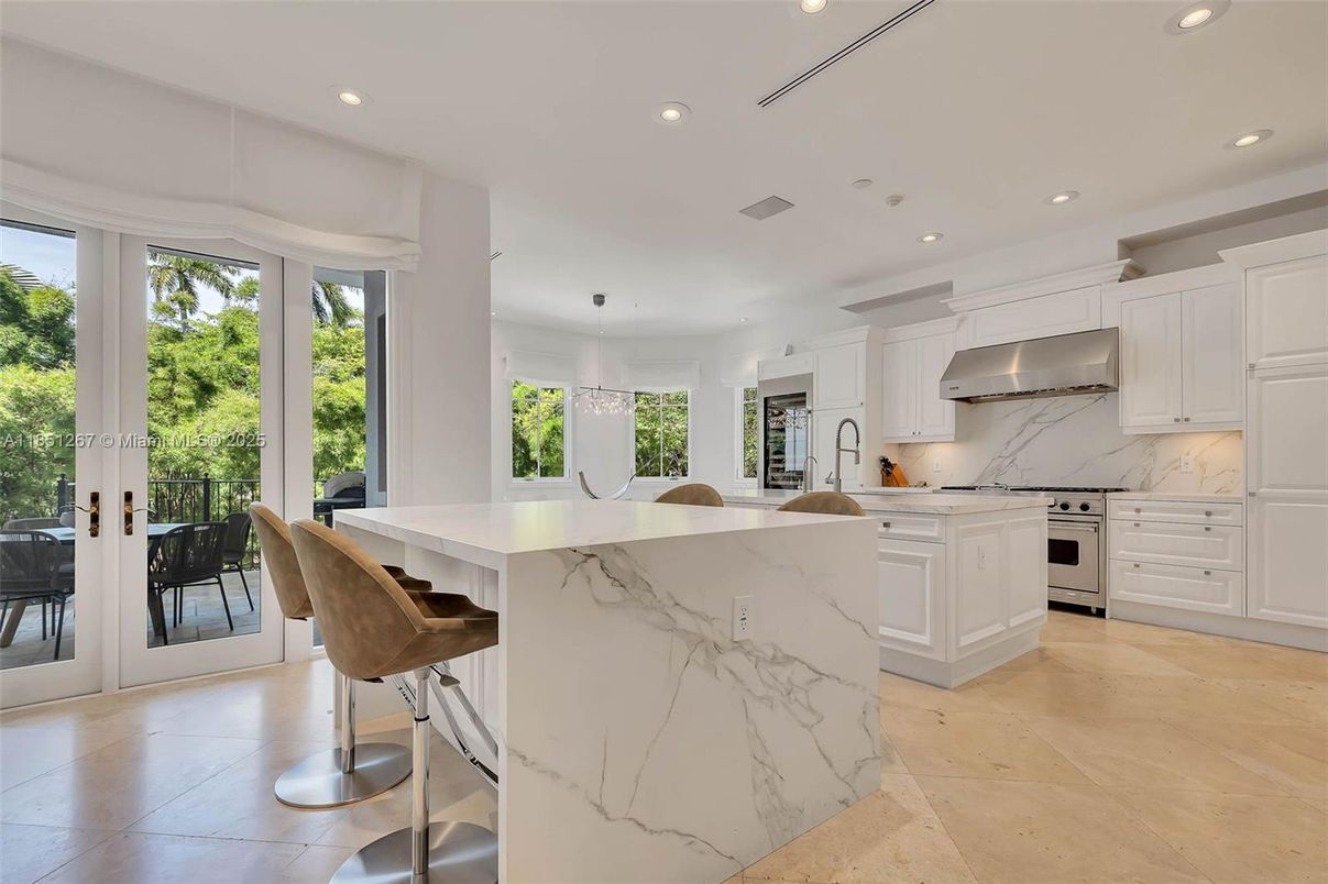 Interior, Kitchen, Marble Walls, Recessed Lighting, Stainless Steel Appliances