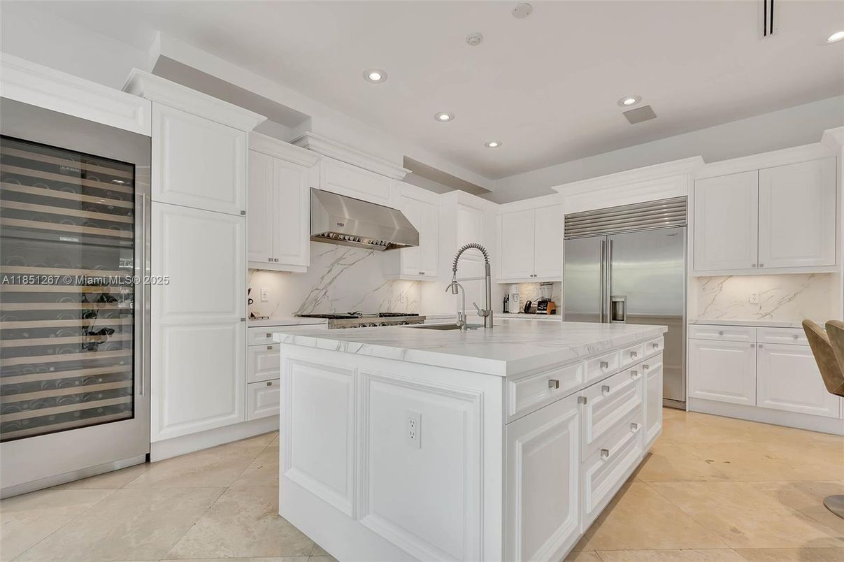 Interior, Kitchen, Marble Walls, Recessed Lighting, Stainless Steel Appliances