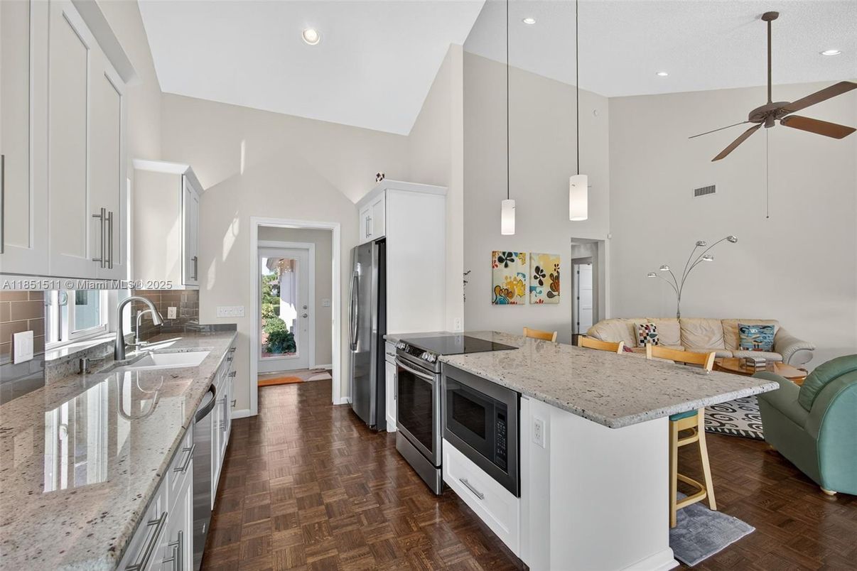 Interior, Kitchen, Pendant Lights, Recessed Lighting, Stainless Steel Appliances, Wood Texture Flooring