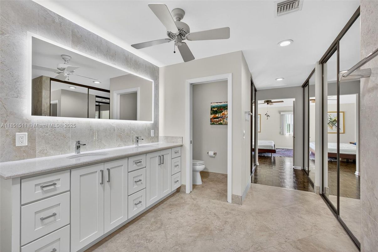 Bathroom, Dual Sink Vanities, Interior, Recessed Lighting, Wood Texture Flooring