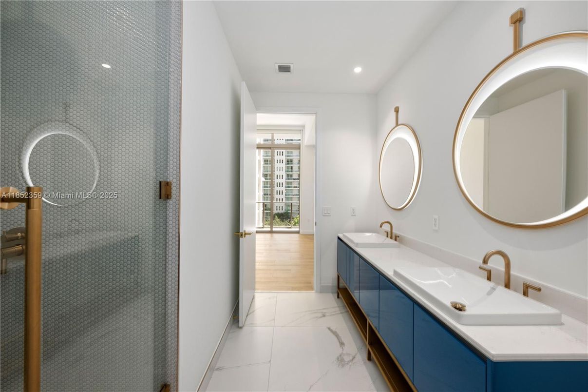 Bathroom, Dual Sink Vanities, Interior, Marble, Recessed Lighting, Wood Texture Flooring