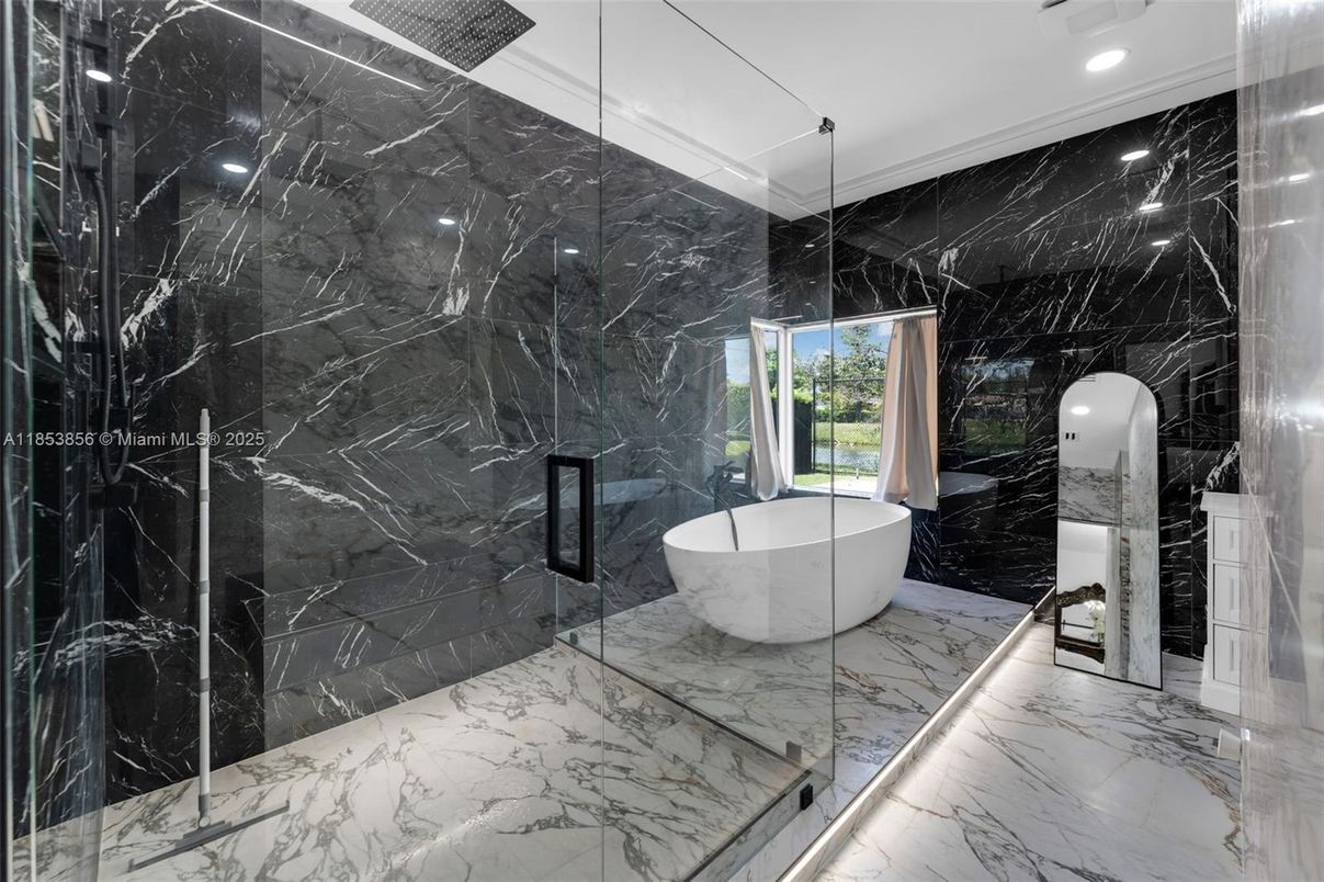 Bathroom, Free Standing Baths, Glass Shower, Interior, Marble, Marble Walls, Recessed Lighting