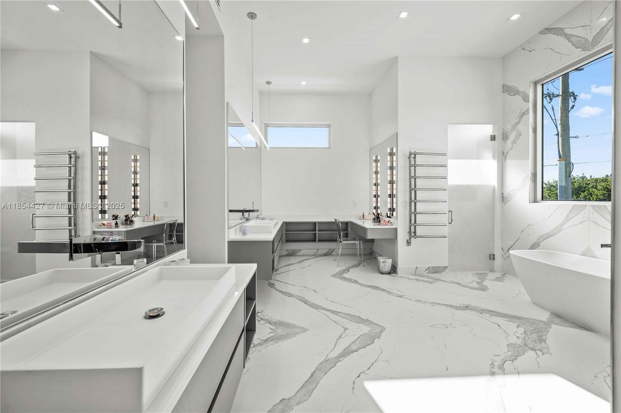 Bathroom, Dual Sink Vanities, Free Standing Baths, Interior, Marble, Marble Walls, Pendant Lights, Recessed Lighting
