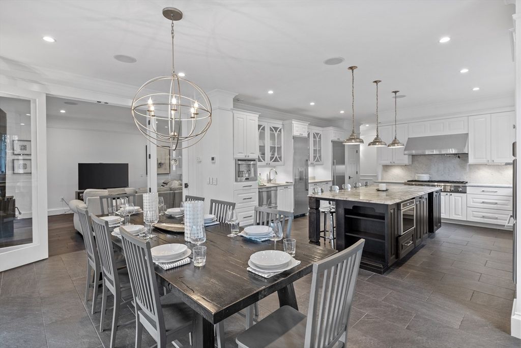 Chandelier, Dining room, Interior, Kitchen, Pendant Lights, Recessed Lighting, Stainless Steel Appliances, Wood Texture Flooring